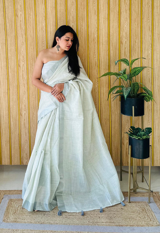 व्हाइट लिनन ब्यूटी ग्रिवा कोलाज और ऑफिस वियर कलेक्शन