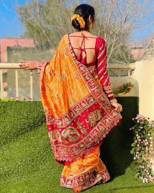 नारंगी पीला मैरून रंग साक्षी सिंह कढ़ाई पैंट पटोला साड़ी विशेष अवसर के लिए
