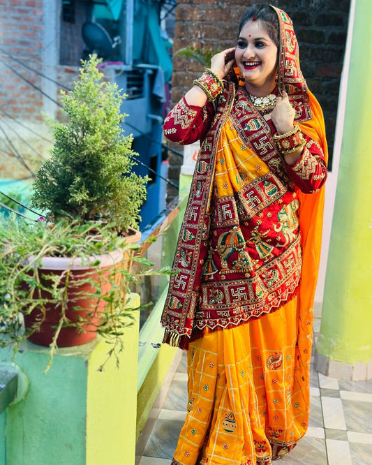 नारंगी पीला मैरून रंग किट्टो जैसवाल कढ़ाई पैंट पटोला साड़ी विशेष अवसर के लिए