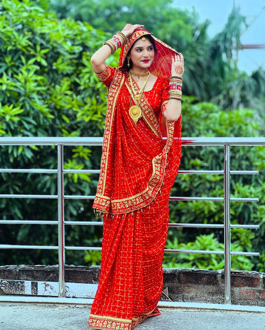 सावित्री ब्रता लाल रंग की विशेष सौभाग्यवती भव साड़ी