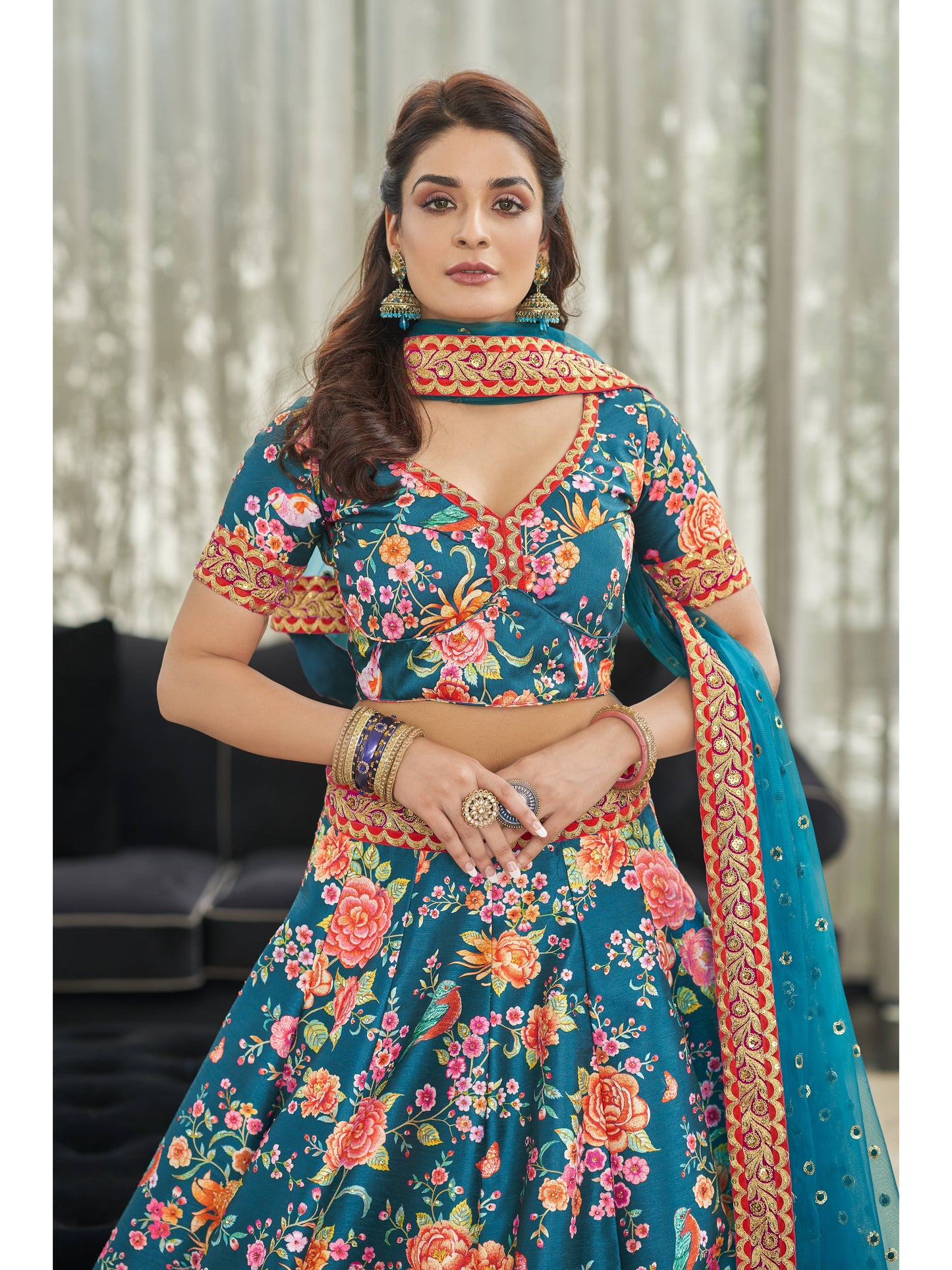 डोरी, सेक्विन और स्टोन वर्क के साथ टीलब्लू कलर डिजिटल प्रिंट लहंगा चोली