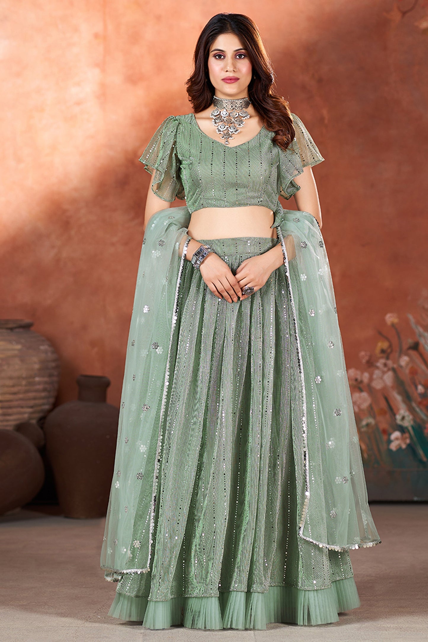 Trendy Sequins Work Sea Green Color Net Fabric Function Wear Lehenga Choli
