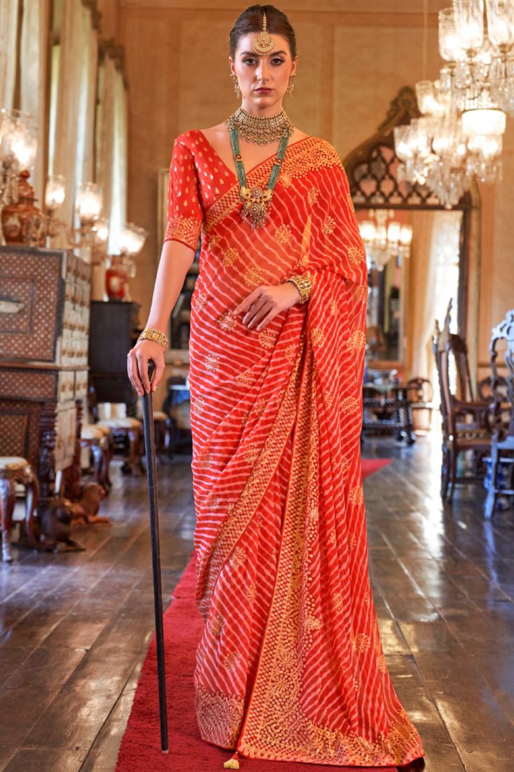 शानदार ऑरेंज कलर जॉर्जेट फ़ैब्रिक कैज़ुअल लुक साड़ी