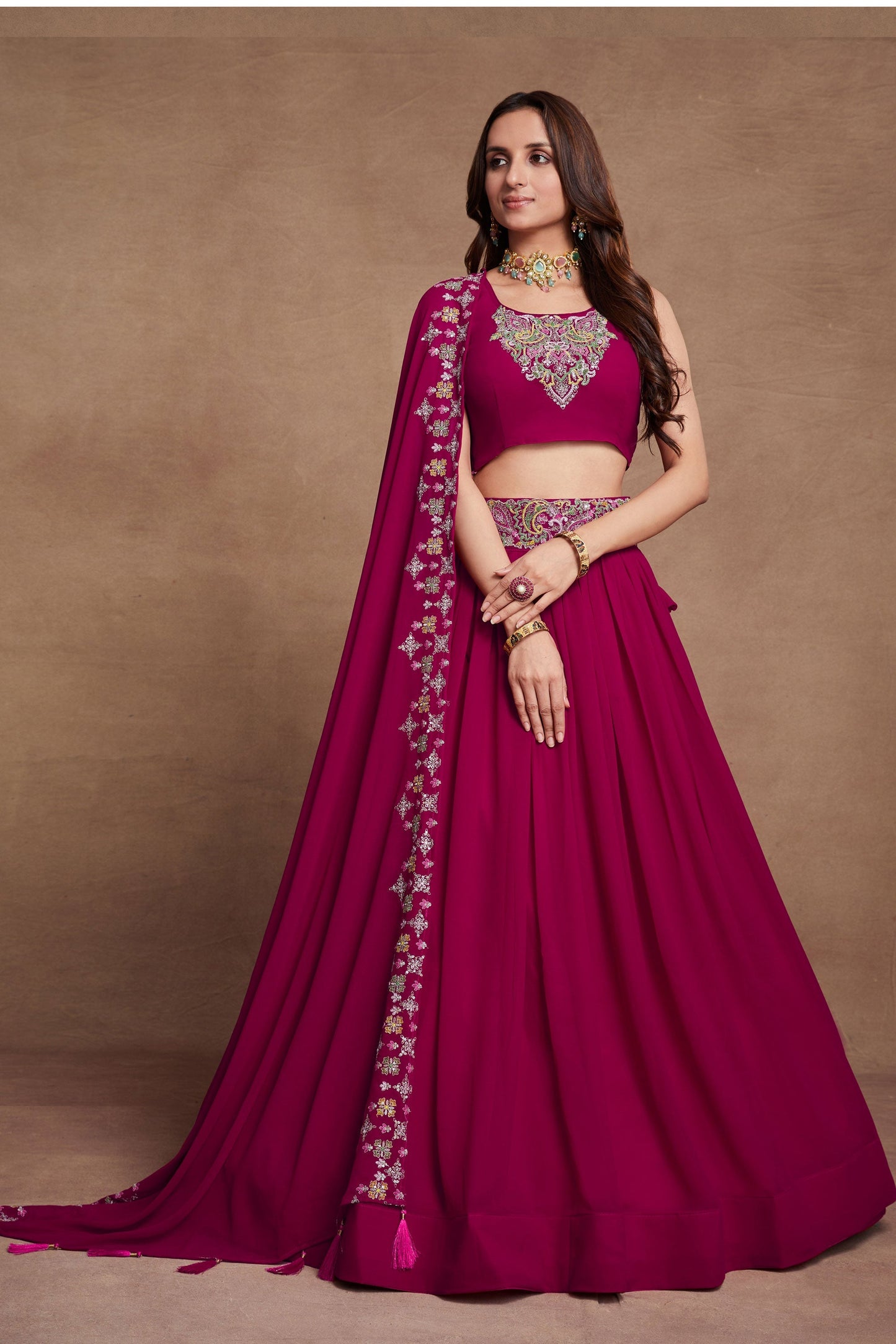 Georgette Fabric Sangeet Wear Embroidered Lehenga Choli In Rani Color