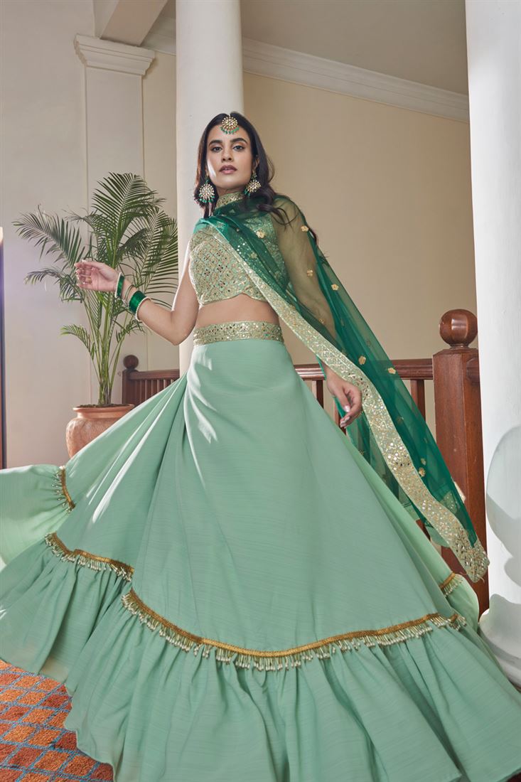 आर्ट सिल्क फैब्रिक में समुद्री हरे रंग का आकर्षक कढ़ाई वाला लहंगा