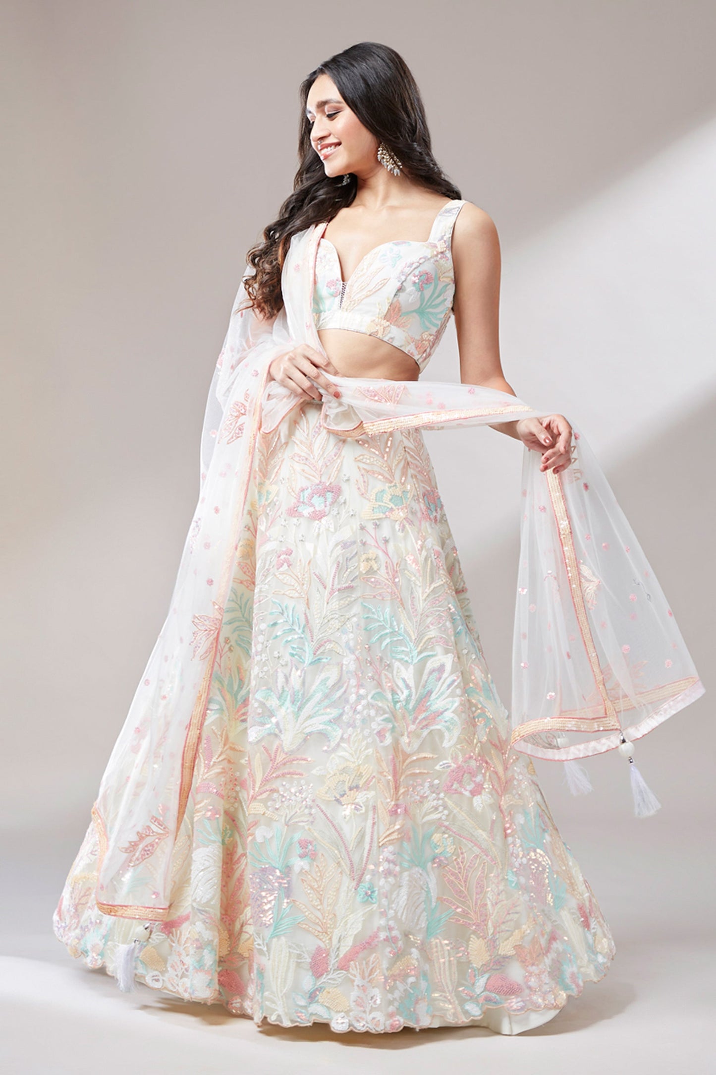 Occasion Wear Sequins Work Lehenga Choli In Cream Color Net Fabric