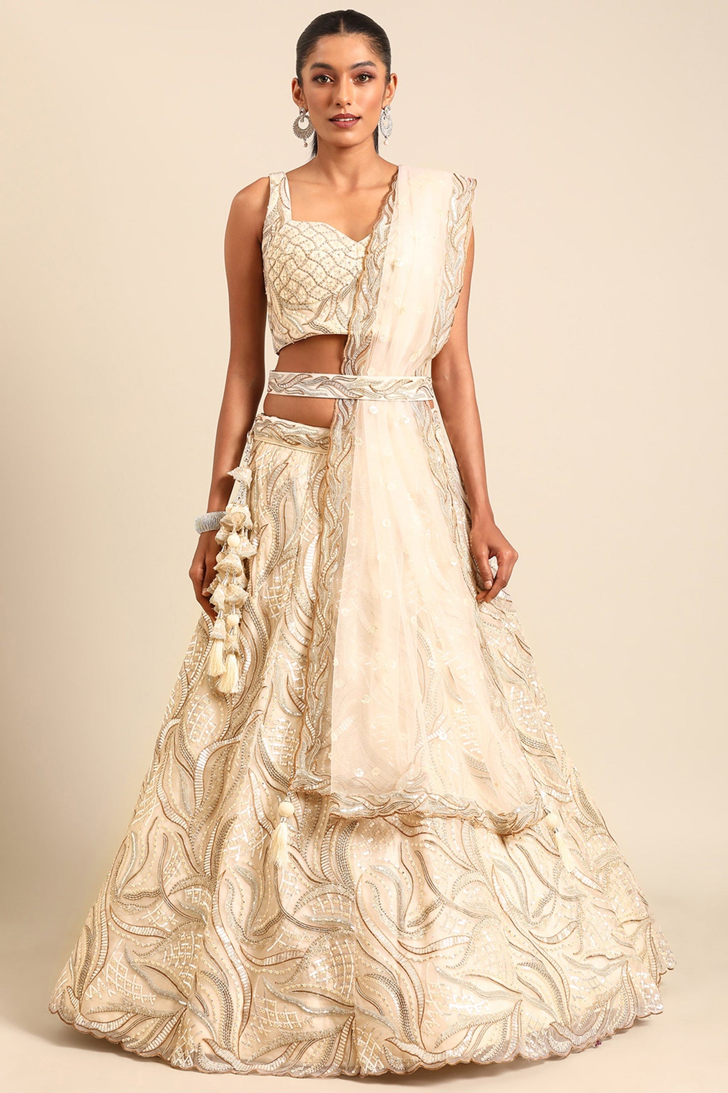 Occasion Wear Sequins Work Lehenga Choli In Cream Net Fabric