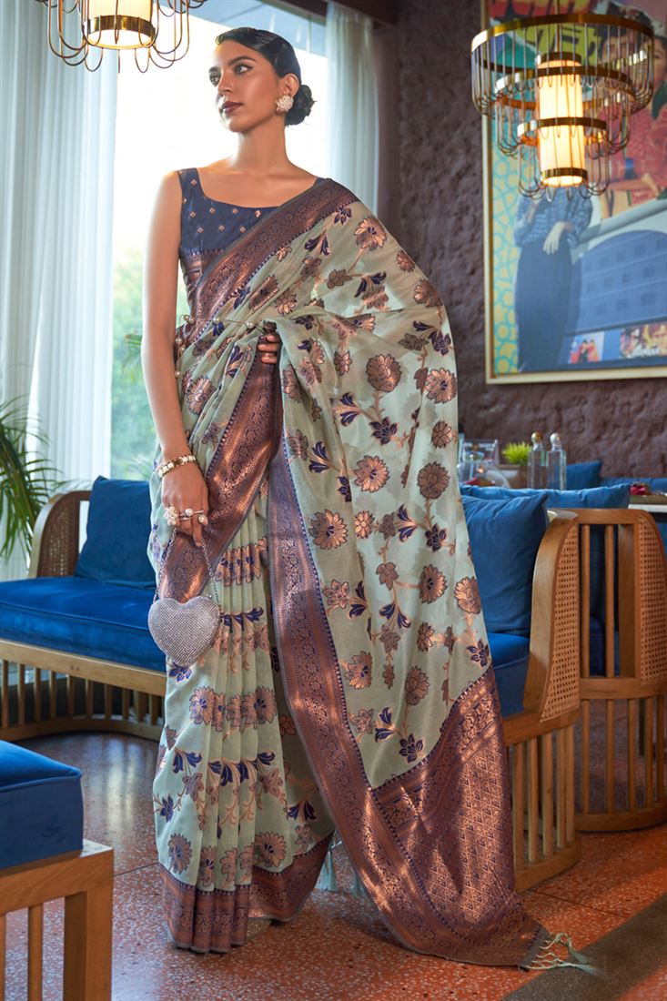 लाइट सियान ऑर्गेंजा शिमर सिल्क साड़ी