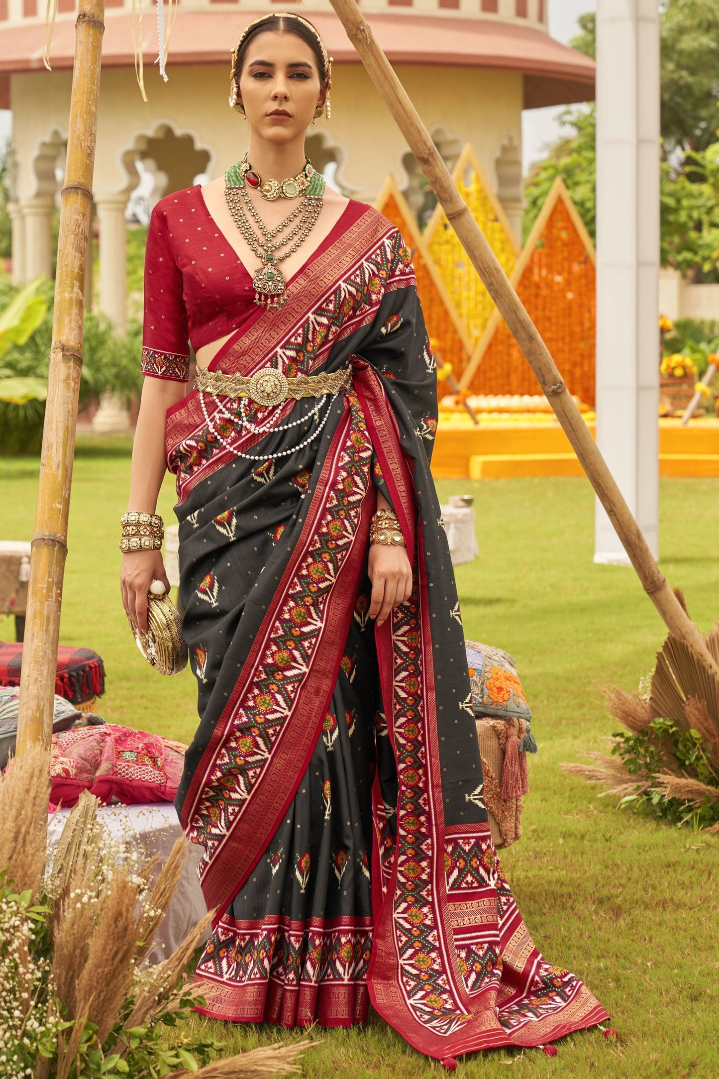 Delightful Black Printed Patola Silk Function Wear Saree