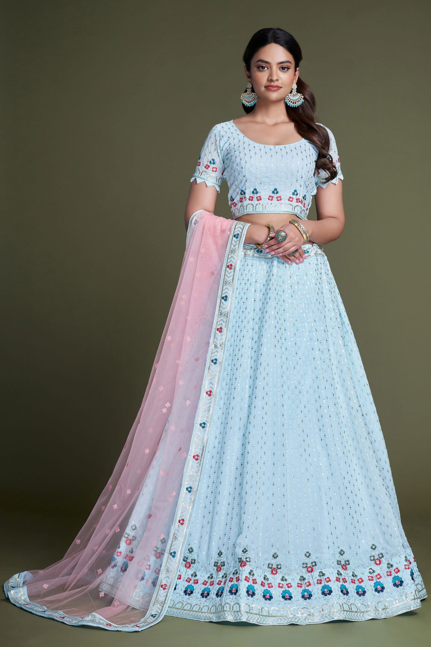 संगीत स्टाइल जॉर्जेट फैब्रिक सेक्विन वर्क लहंगा लाइट सियान कलर में