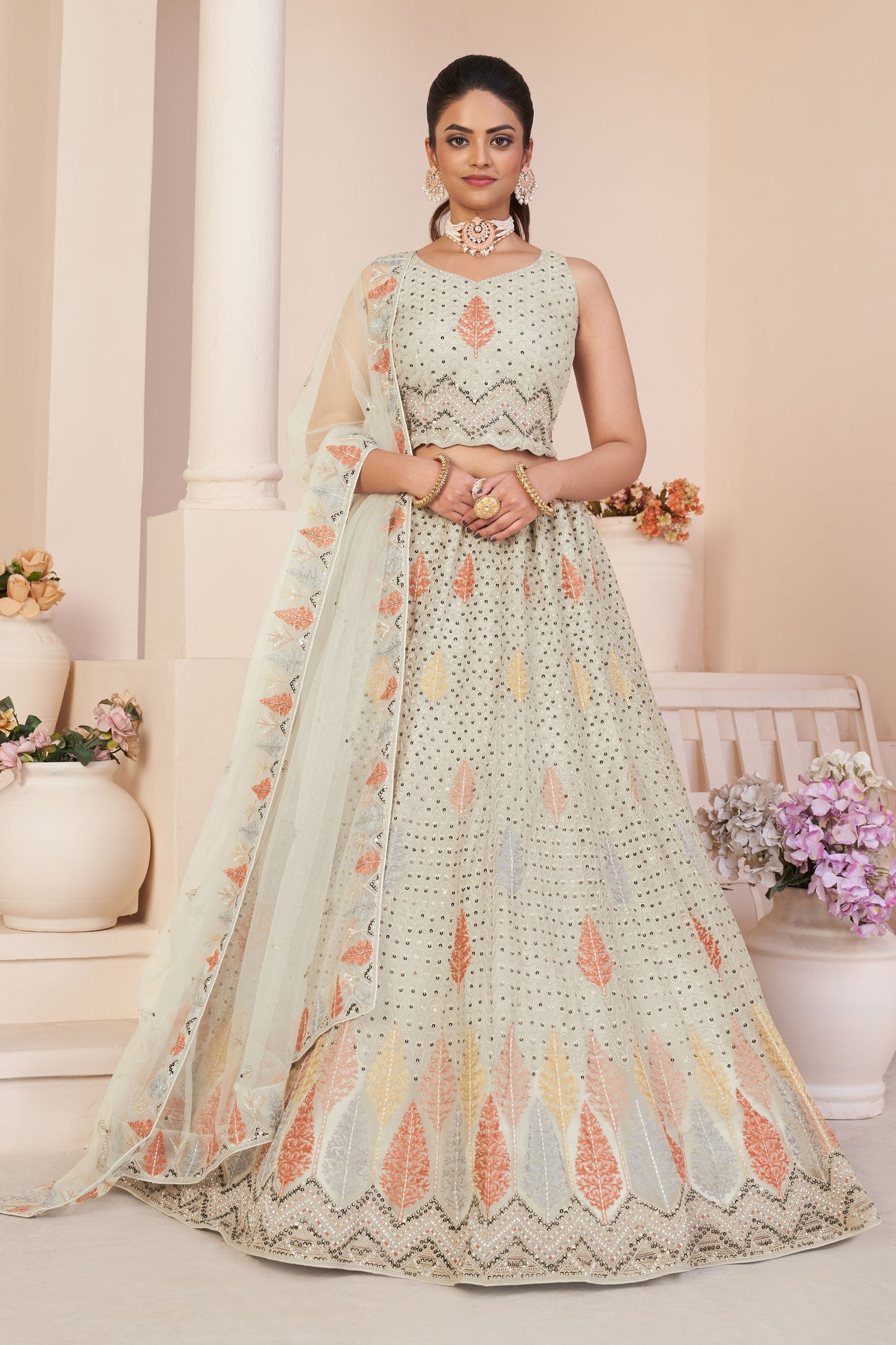 Off White Color Net Fabric Sequins Work Embellished Lehenga