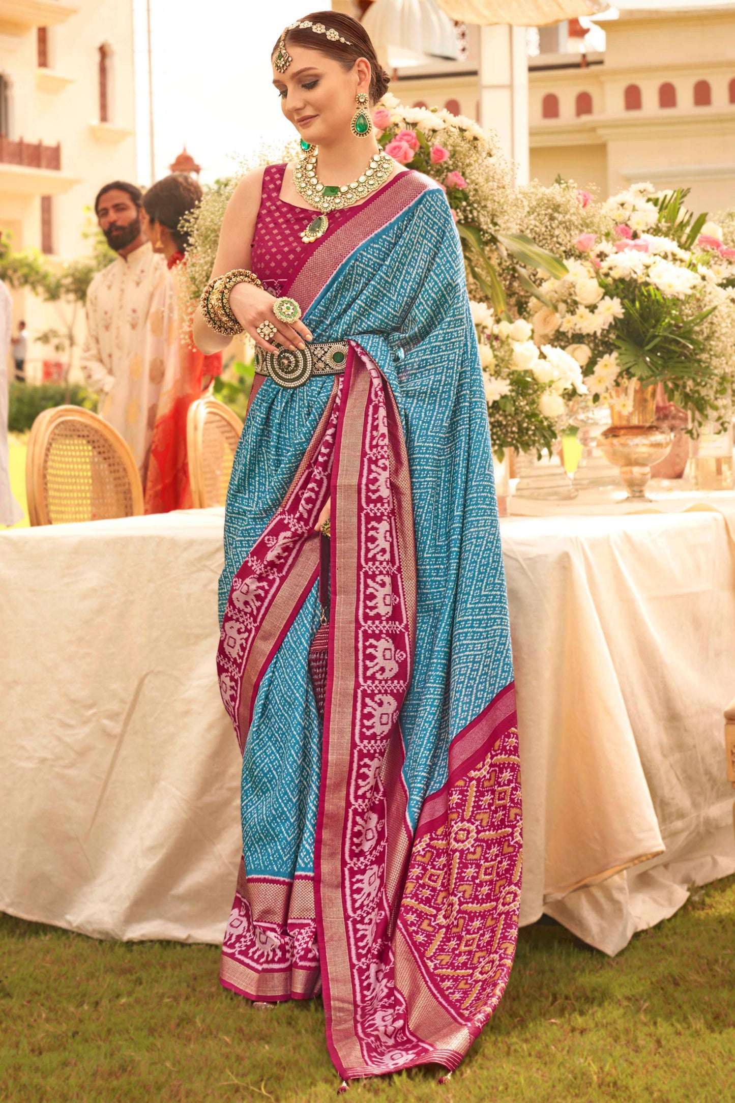 Art Silk Fabric Pleasant Cyan Color Printed Patola Saree