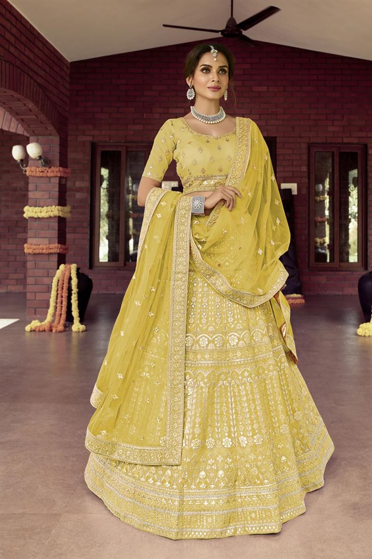 Exclusive Classic Embroidered Work On Yellow Color Bridal Lehenga In Art Silk Fabric