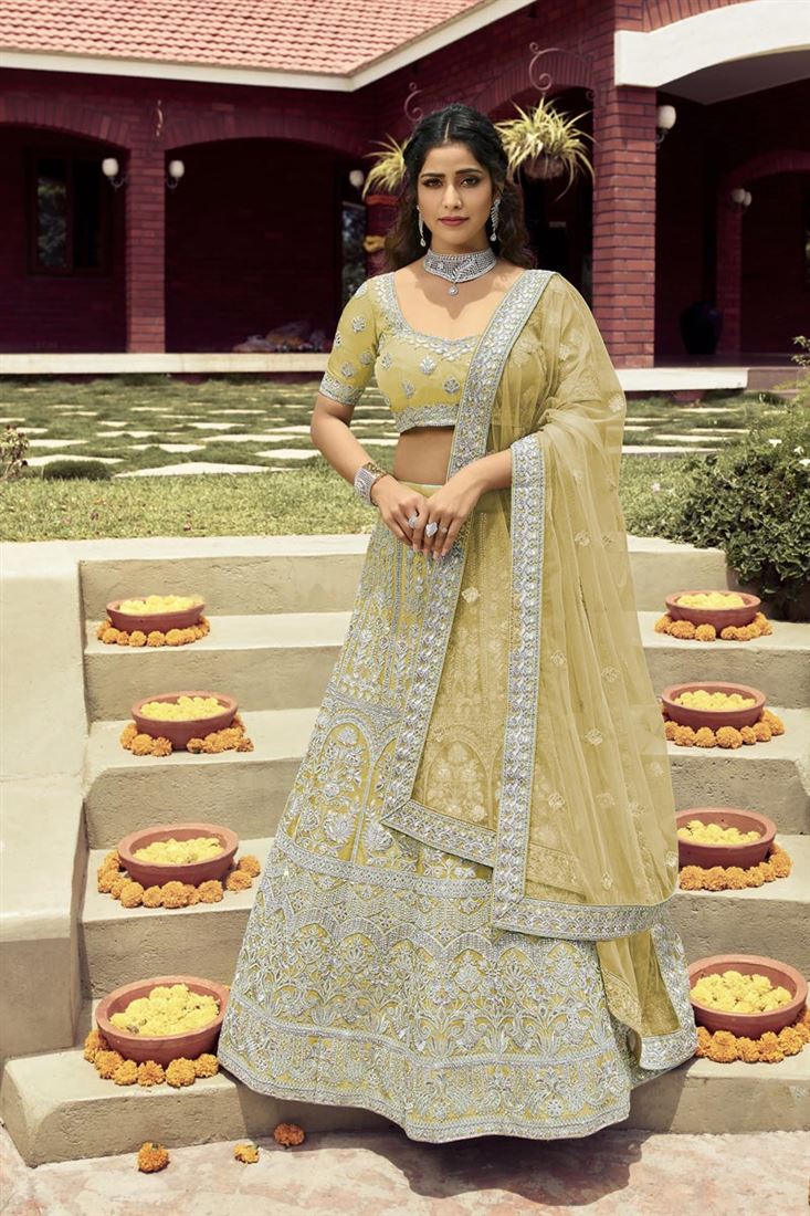 Exclusive Yellow Color Wedding Wear Art Silk Fabric Bridal Lehenga With Embroidered Work