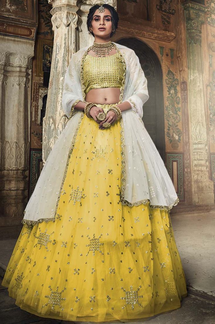 एक्सक्लूसिव संगीत वियर नेट फ़ैब्रिक पीला रंग सेक्विन वर्क आकर्षक लहंगा