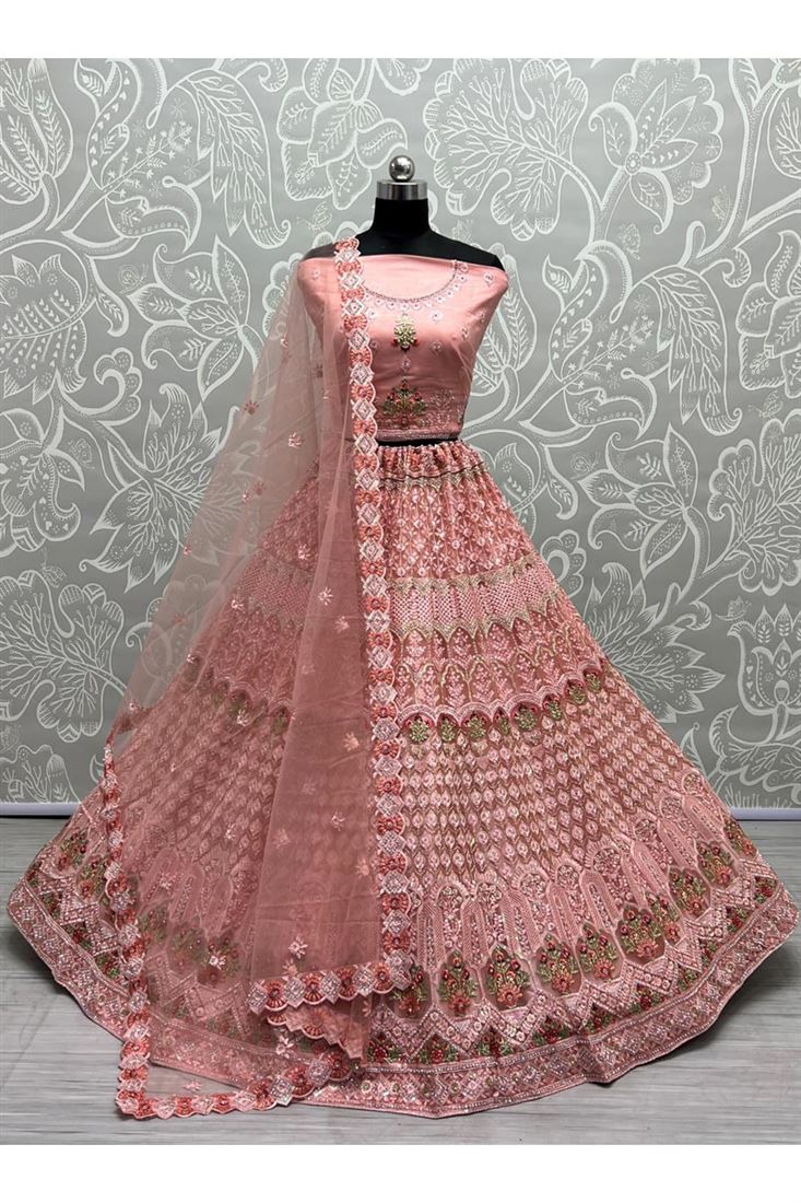 Net Fabric Brilliant Sequins Work Bridal Look Lehenga In Peach Color
