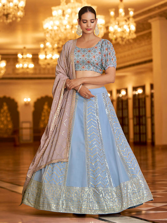 स्काई और डस्टी पिंक गॉर्जेट कढ़ाई वाला डिज़ाइनर लहंगा चोली