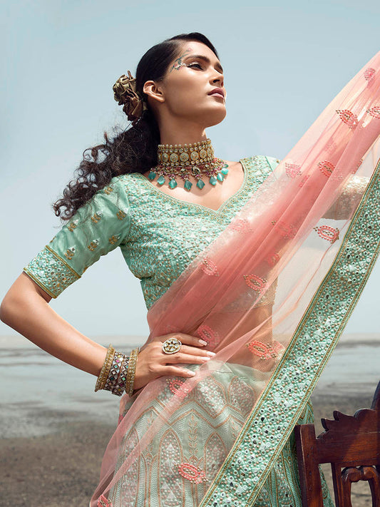 फ़िरोज़ी ऑर्गेंजा कढ़ाई वाला डिज़ाइनर लहंगा चोली