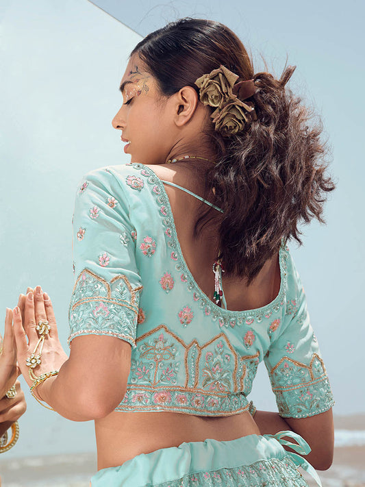 फ़िरोज़ी जॉर्जेट कढ़ाई वाला डिज़ाइनर लहंगा चोली