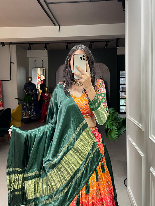 हरा रंग पटोला प्रिंटेड गाजी सिल्क लहंगा चोली