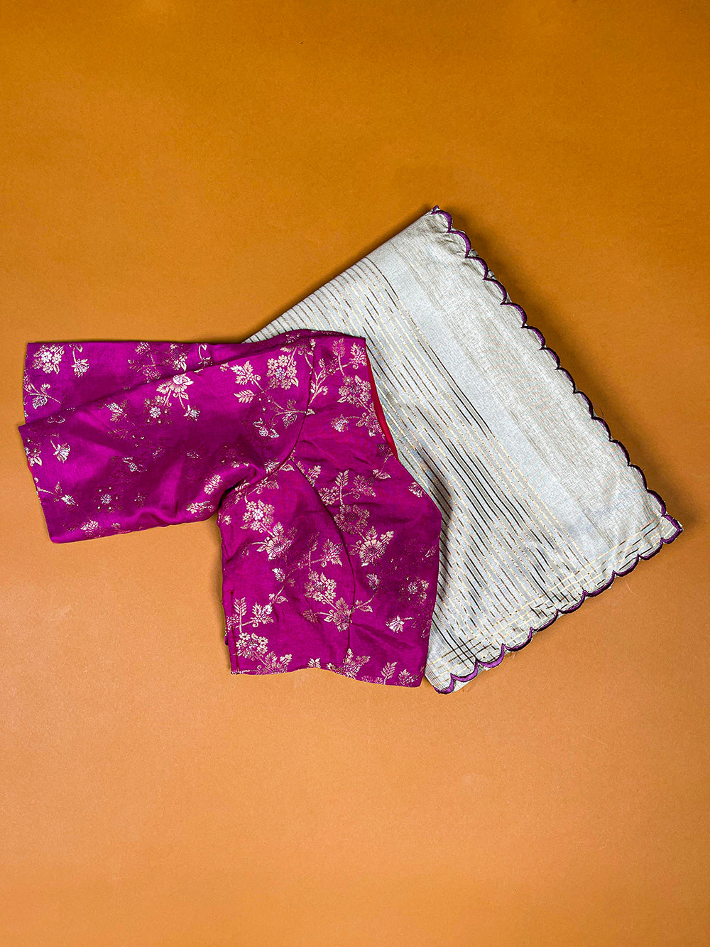 रानी पिंक कलर की आर्का वर्क मणिपुरी टसर साड़ी