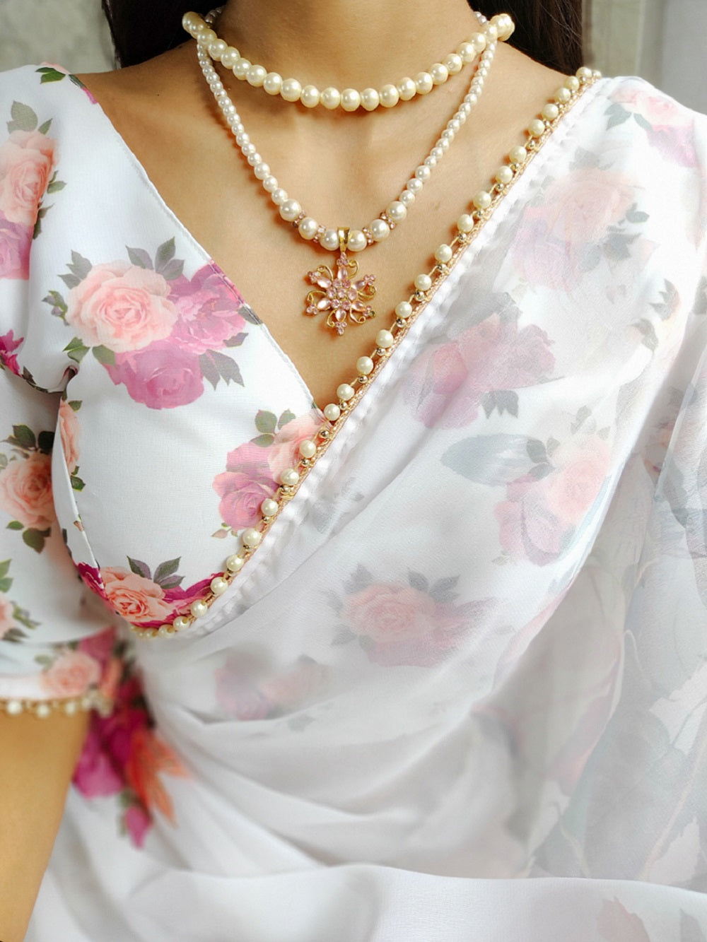 White Color Printed With Pearl Lace Border Georgette Saree