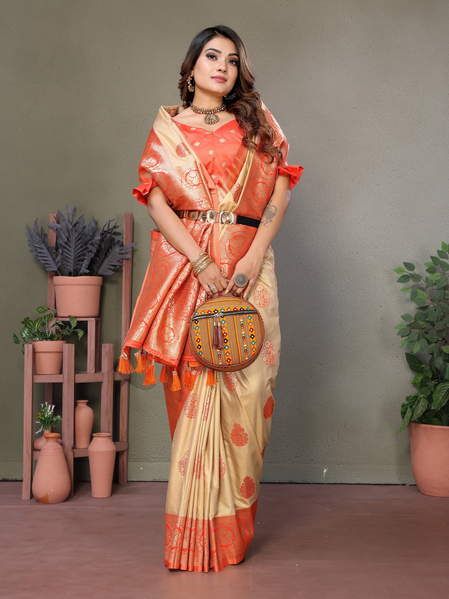 Orange Jugani Viscose silky sarees that are soft and with all over weaving butties in the body