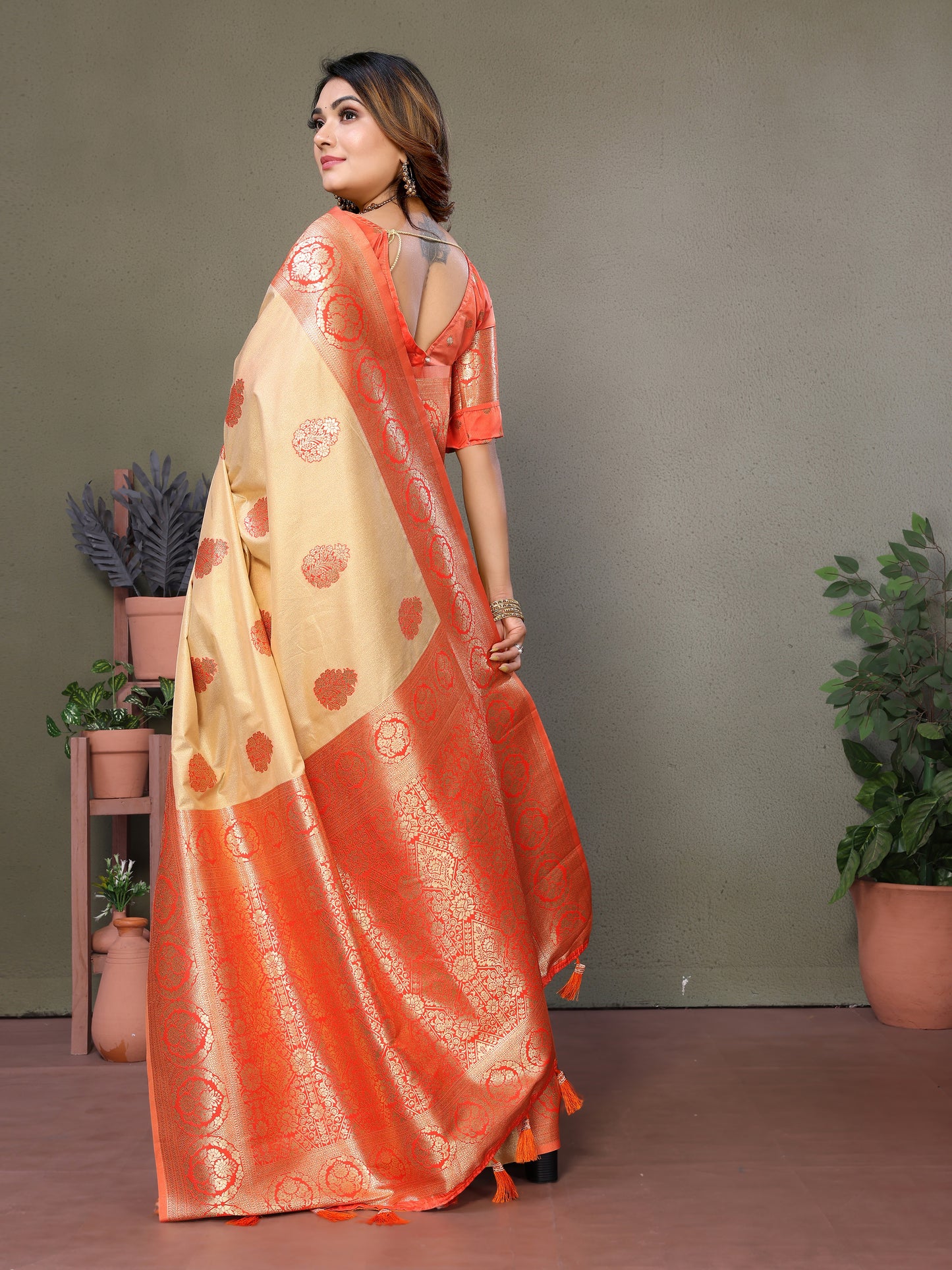 Orange Jugani Viscose silky sarees that are soft and with all over weaving butties in the body