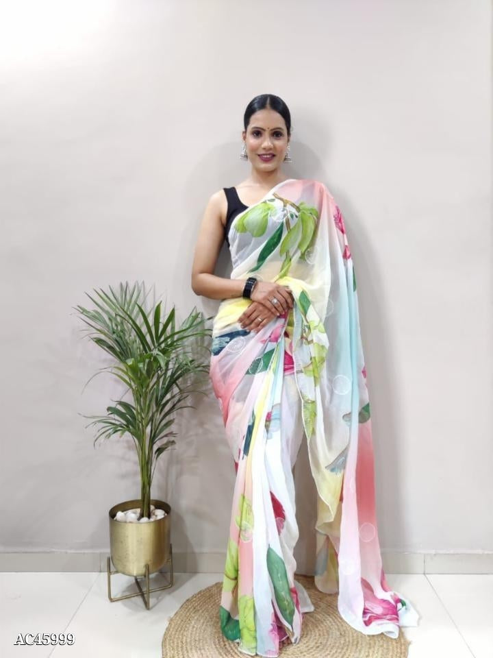 खिलता हुआ जॉर्जेट कपड़ा
 पूरी साड़ी पर सीक्वेंस वर्क, कट वर्क बॉर्डर के साथ साड़ी पर खूबसूरत प्रिंट