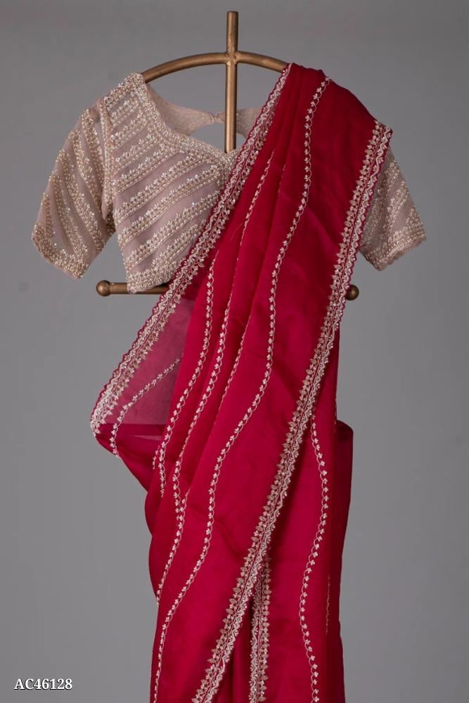 शुद्ध ऑर्गेनाज़ा
 कार्य: कढ़ाई अनुक्रम सी-लड़कन के साथ पल्लू कार्य