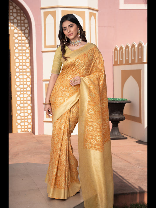 पीले रंग की इक्कत कॉटन इक्कत सिल्क साड़ी ज़री बुनी हुई