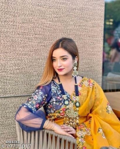 कढ़ाई शुद्ध ऑर्गेना साड़ी ब्लाउज के साथ