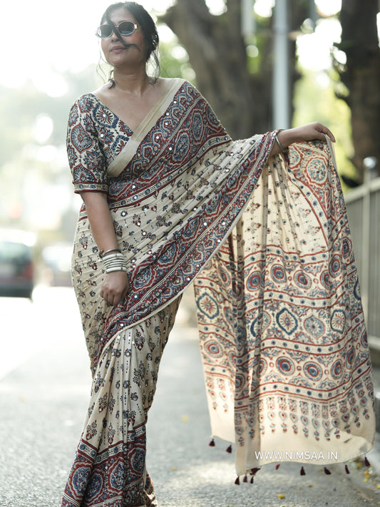 Accessible Cream Semi Silk Saree with Real Mirror and Pompom Pallu Design