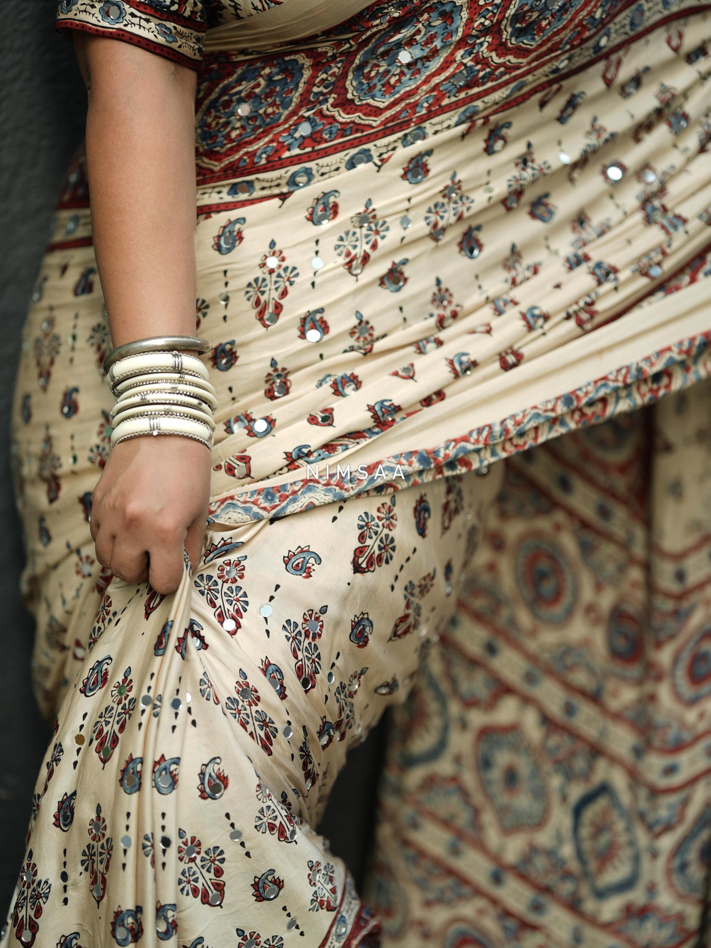 Accessible Cream Semi Silk Saree with Real Mirror and Pompom Pallu Design