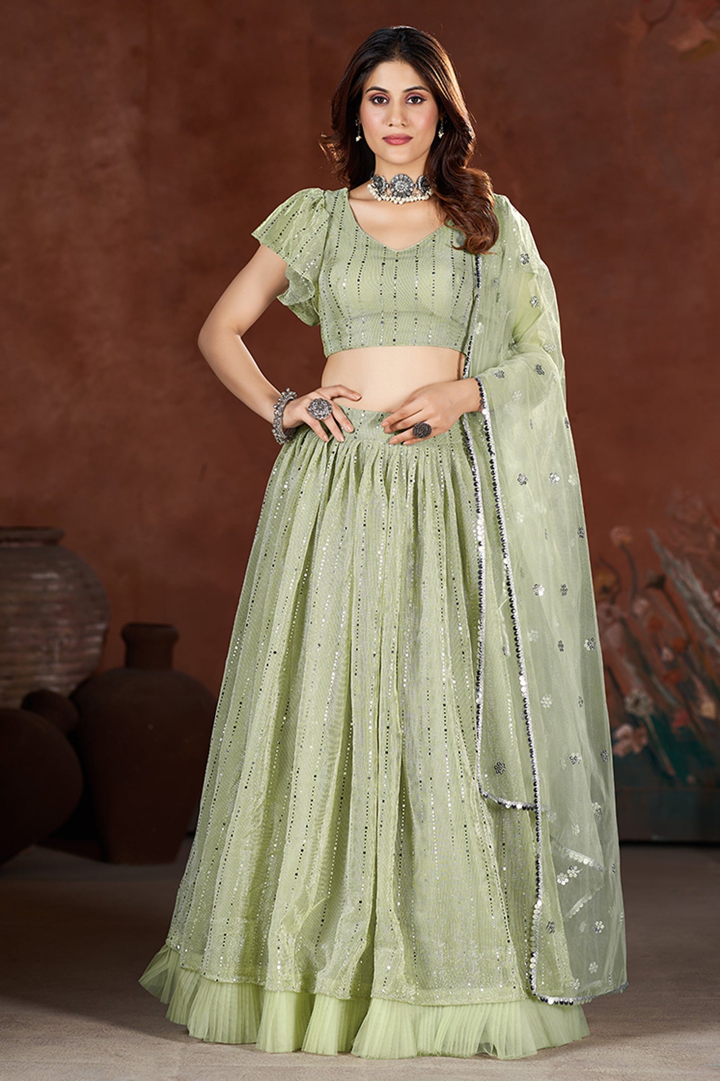 Green Color Alluring Sequins Work Lehenga Choli In Net Fabric