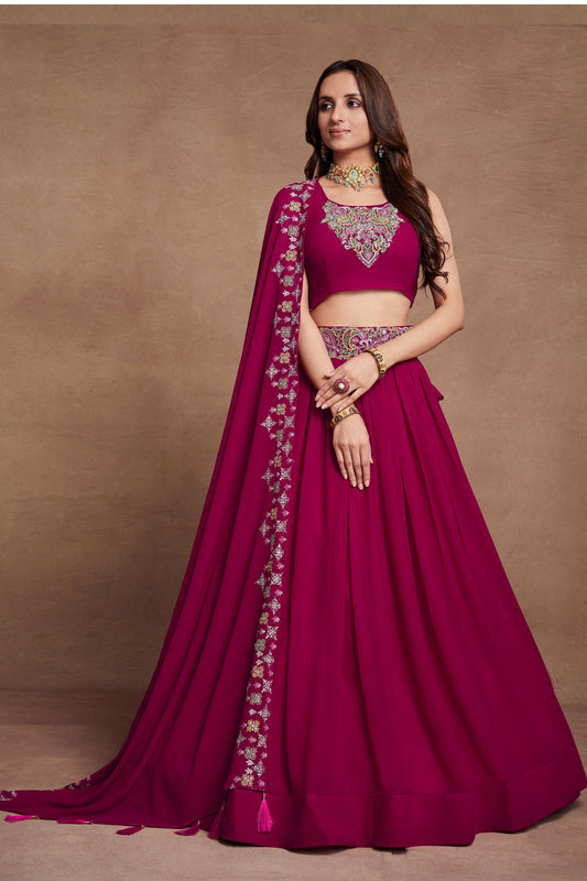 Georgette Fabric Sangeet Wear Embroidered Lehenga Choli In Rani Color