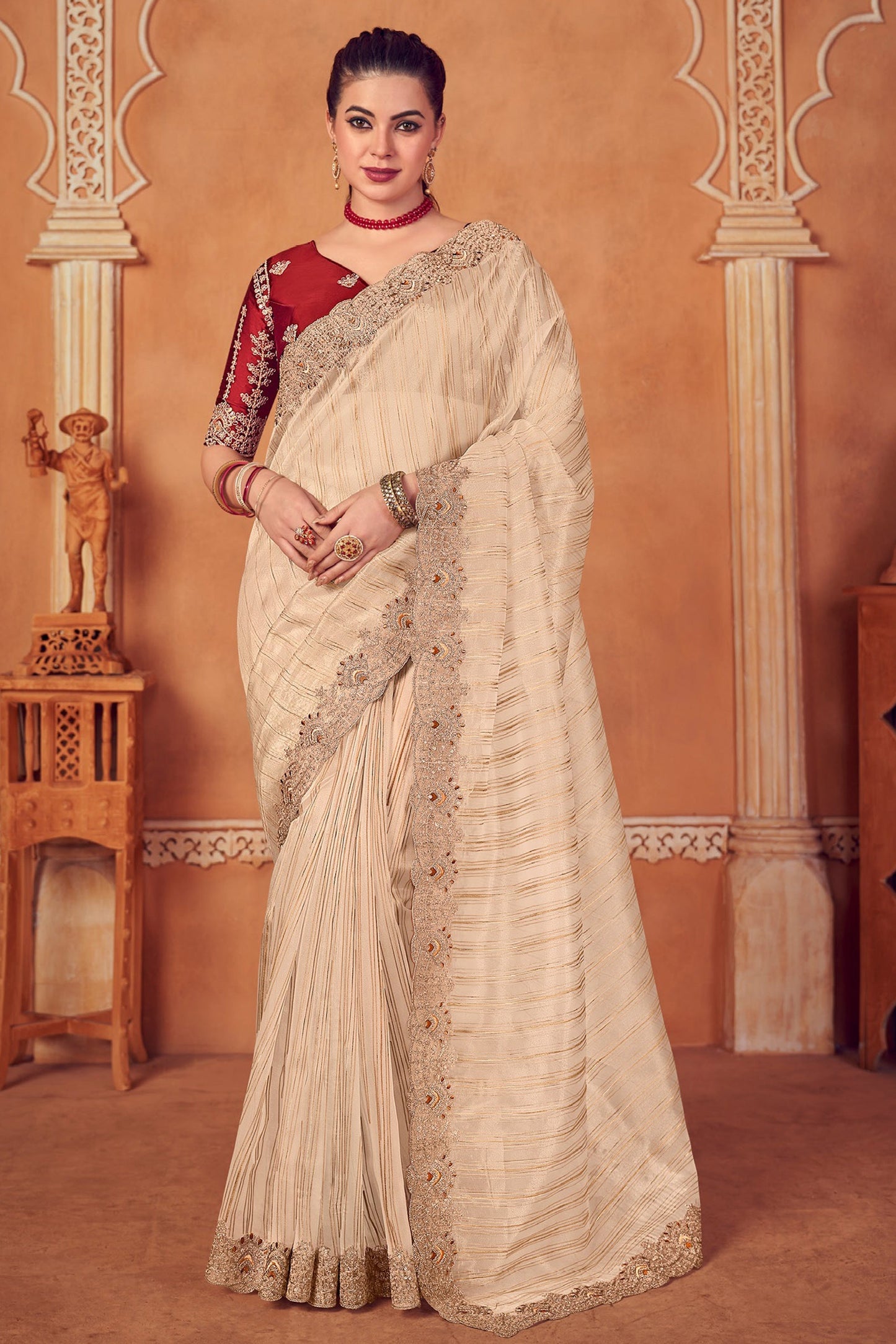 Soothing Border Work Organza Saree In Cream Color