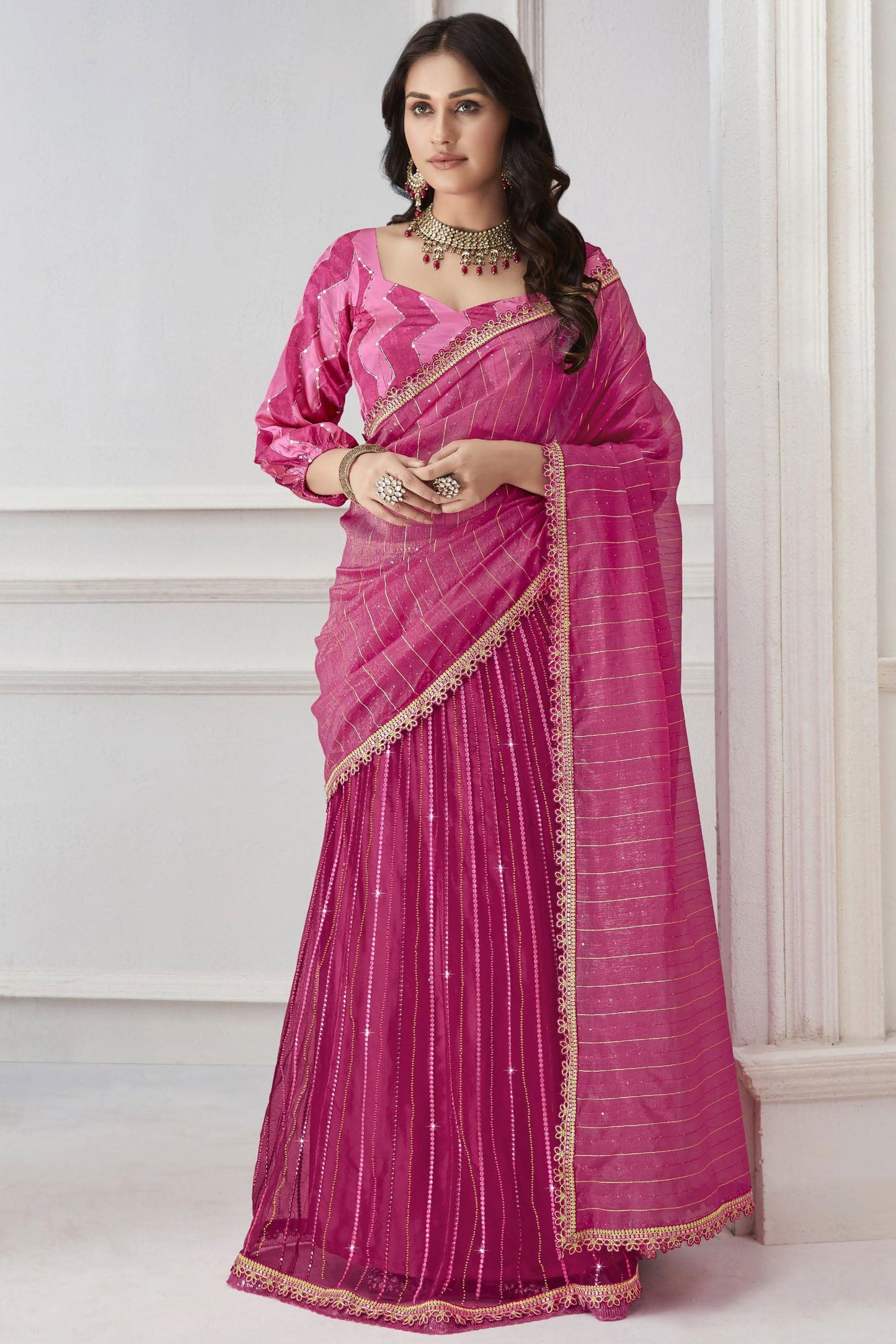 Engaging Rani Color Organza And Net Fabric Saree With Embroidered Work