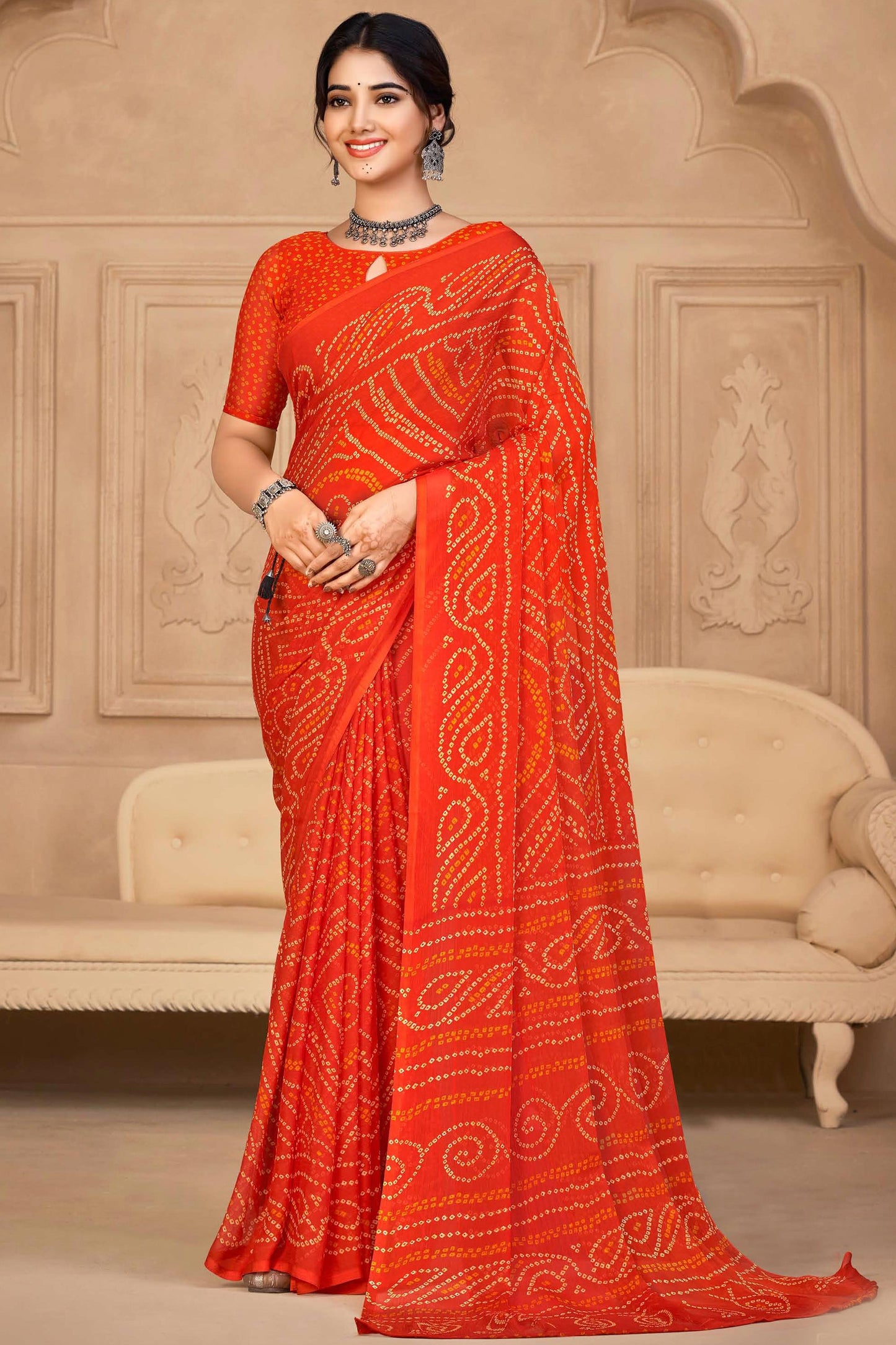 Chiffon Fabric Orange Color Bandhej Print Casual Fancy Saree