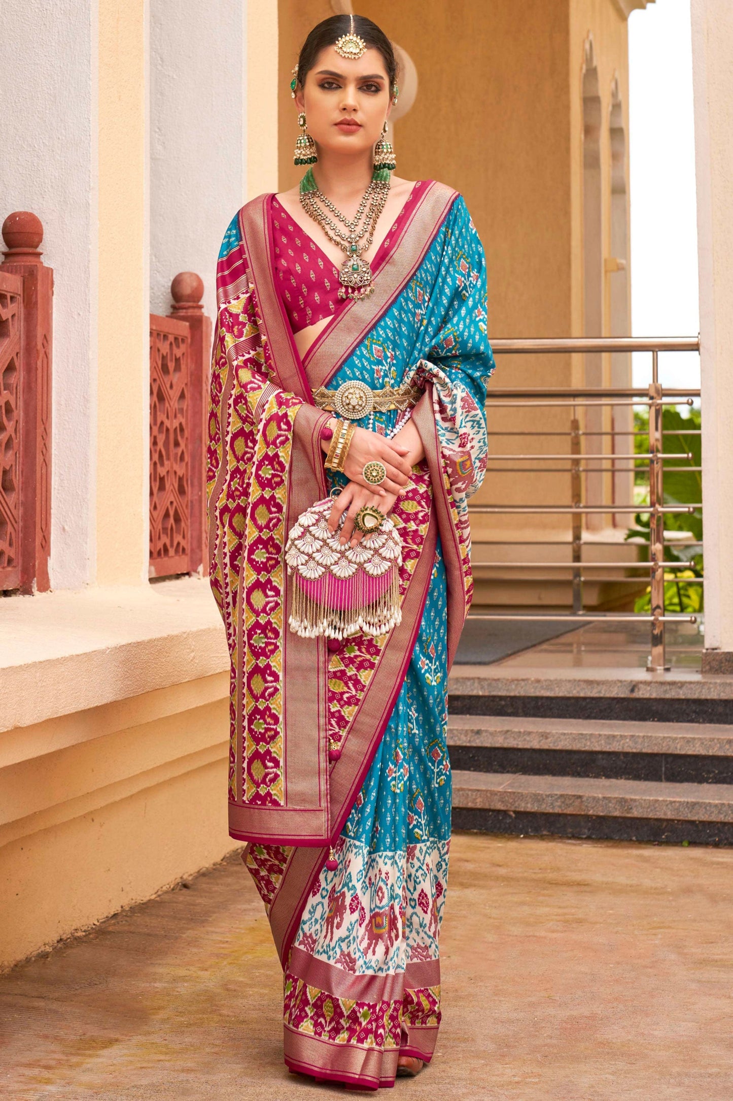 Attractive Cyan Printed Patola Silk Traditional Saree