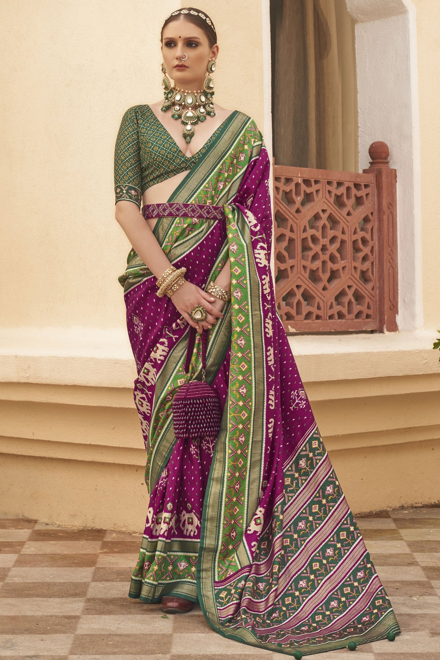 Delightful Purple Printed Patola Silk Function Wear Saree