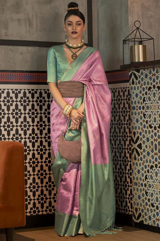 बुनाई के काम के साथ गुलाबी रंग की आर्ट सिल्क शानदार साड़ी