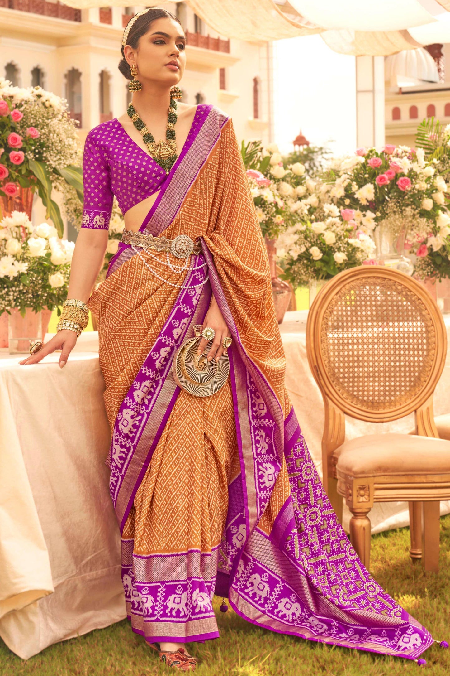 Art Silk Fabric Rich Orange Color Festive Wear Printed Patola Saree