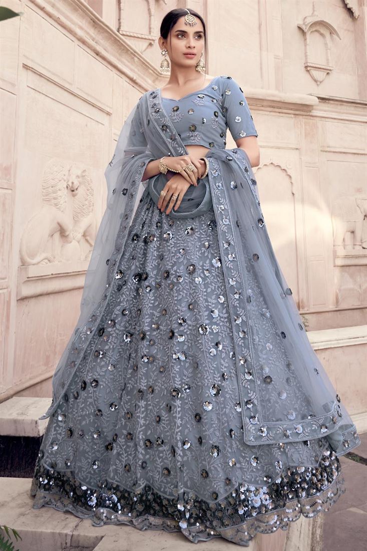 एक्सक्लूसिव सेक्विन वर्क नेट फ़ैब्रिक रिसेप्शन वियर लहंगा