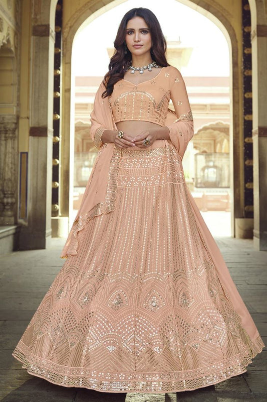 एक्सक्लूसिव संगीत वियर ठाठ जॉर्जेट फैब्रिक सेक्विन वर्क लहंगा पीच कलर में