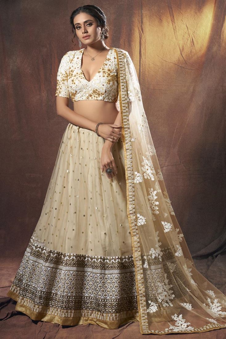 एक्सक्लूसिव बेज कलर नेट फैब्रिक वेडिंग वियर लहंगा चोली