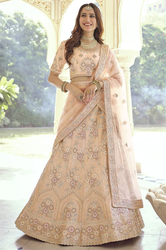 एक्सक्लूसिव क्रेप फैब्रिक संगीत वियर स्टाइलिश लहंगा पीच कलर में