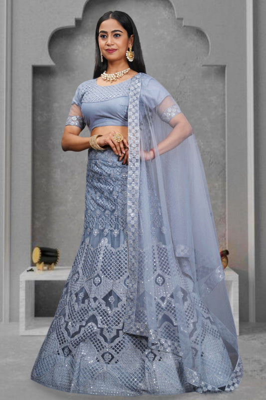 ग्रे कलर के नेट फैब्रिक लहंगे पर सुखदायक सेक्विन वर्क