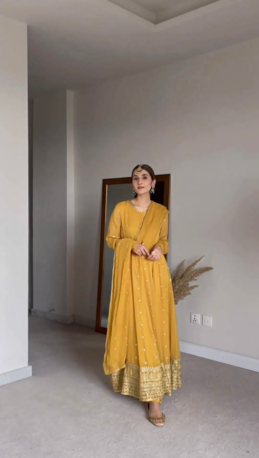 Party Wear Yellow Embroidery Stitched Gown