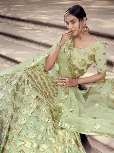 Pista Green Soft Net Heavy Embroidered Lehenga